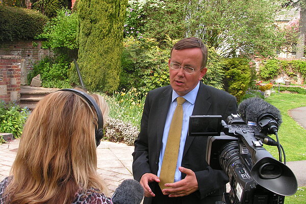 Martin speaking to the media